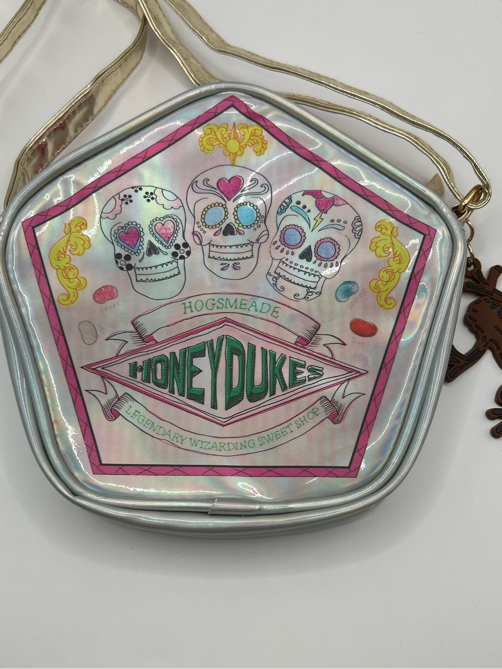 Honeydukes Holographic Silver Crossbody Bag with Pink Accents